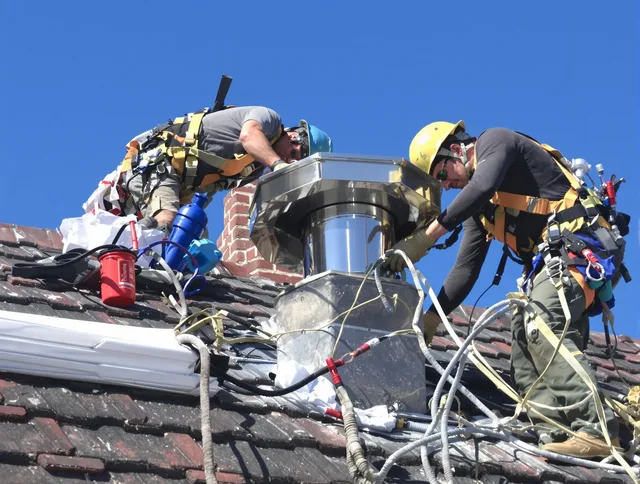 Protective chimney cap installed by Greeley Chimney Sweep in Greeley, CO